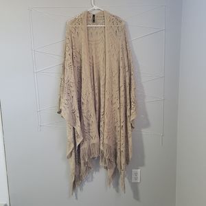 Beige Lace and Fringe wrap from Torrid